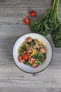 sorghum bowl with corn and tomatoes